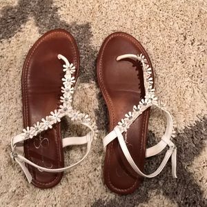 White Jessica Simpson sandals.